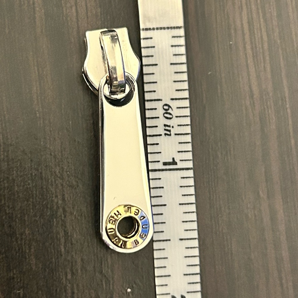 Henri Bendel silver replacement zipper pull